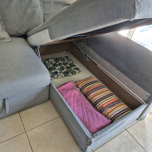 IKEA HOLMSUND corner sofa bed used with storage and washable covers