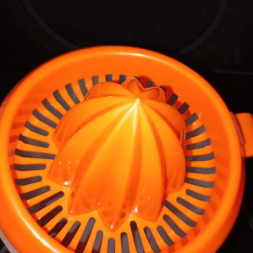 Lemon squeezer and glass new, orange color set