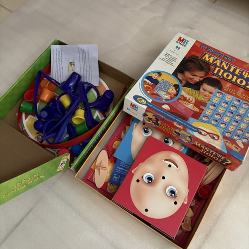 Set of 2 board games: Guess Who (Hasbro) + Pseftarades Mytarades (AS)