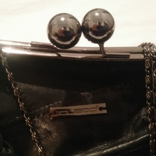 Custo black leather handbag used with straps