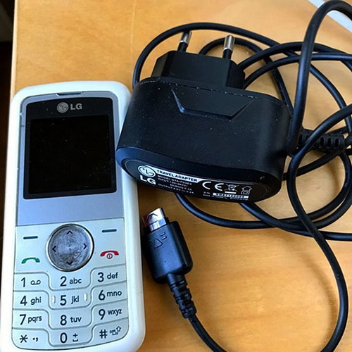 LG KP100 mobile phone used with original charger and battery