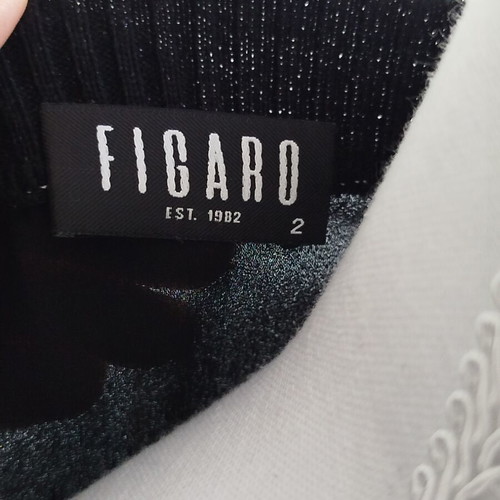 Figaro blouse black and white with wide sleeve and black sequins like new