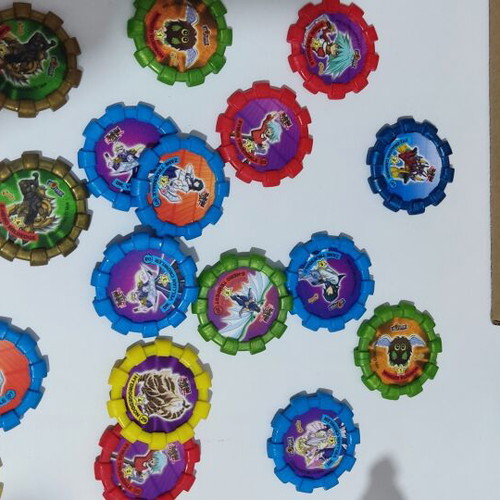 Various Pokémon and other collectible pogs