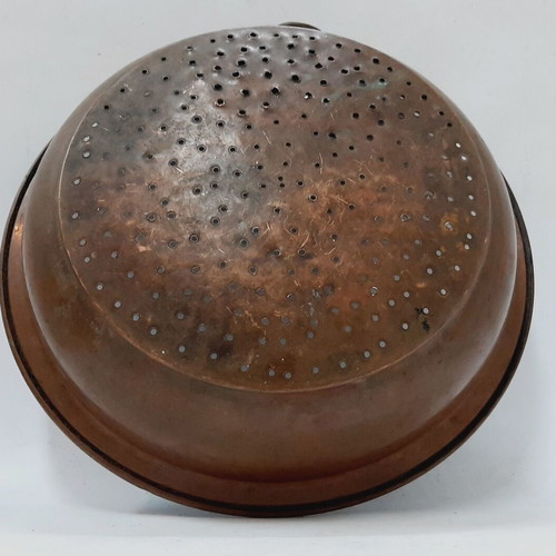 Vintage copper colander with brass ring handle, used, 30.5 cm
