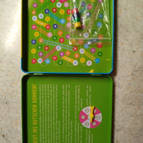 Travel board game in metal box IV like new
