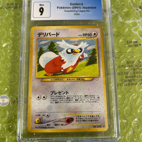 Delibird Awakening Legends Pokemon card used CGC 9