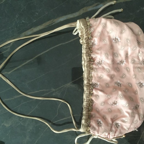 Women's handheld bag used, soft pink for evening outings