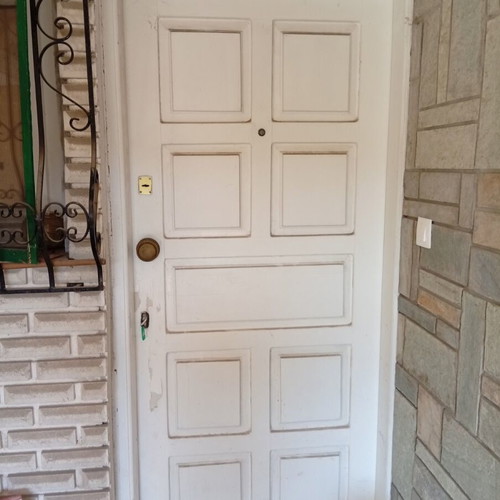 White wooden exterior door