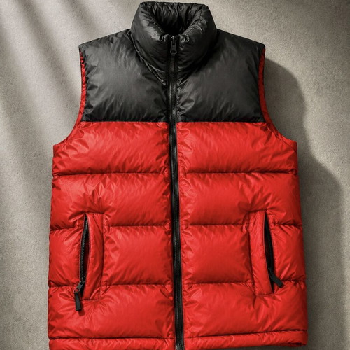The North Face red and black puffer vest used, size M