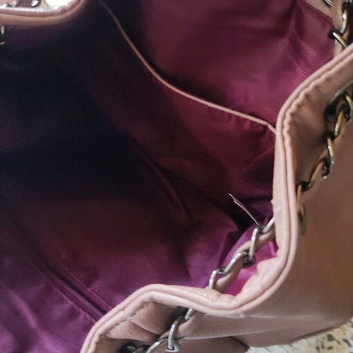 Backpack like new with quilted texture and handles