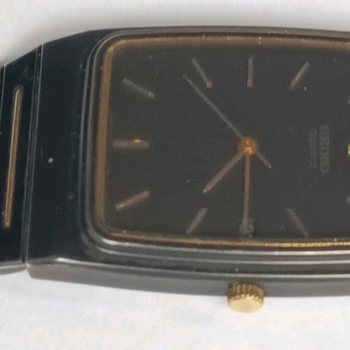 Seiko 2A32-5059 wristwatch used with black bracelet