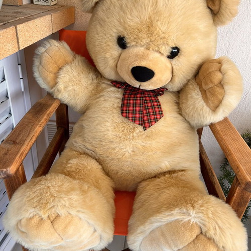 Giant teddy bear with checkered bow, like new