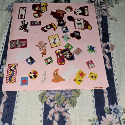 Sticker album used with various stickers from Little Heroes