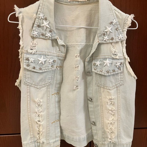 Sleeveless denim jacket used, size medium, blue