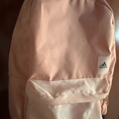 Adidas backpack like new with spacious compartment, laptop fit
