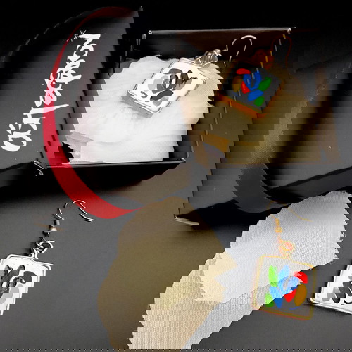 Σκουλαρίκια Άπεφθον καινούργια με πολύχρωμο σχέδιο σε λευκό φόντο