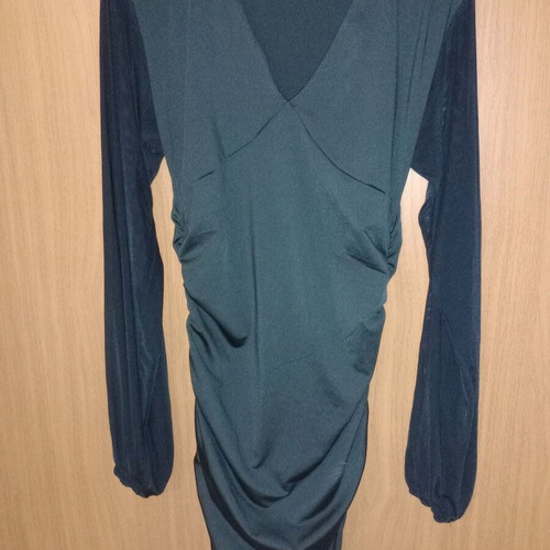 Black fitted dress with ruching and transparent sleeves like new
