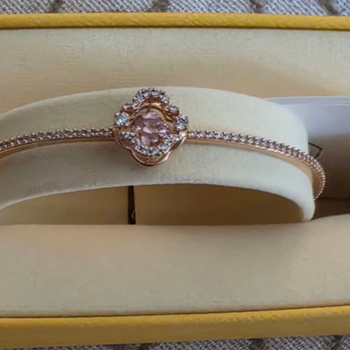 Swarovski jewelry set 18ct gold plated, like new, bracelet and rings