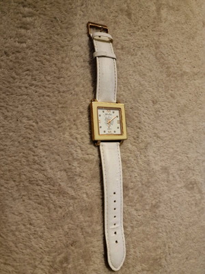 Valentini watch used with white leather strap