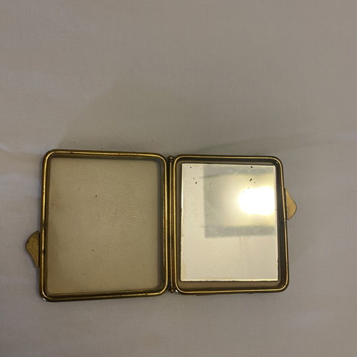 Vintage metal powder compact with mirror, used, black and gold enamel