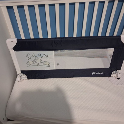 Baby cot with rails, like new, includes mattress and protector