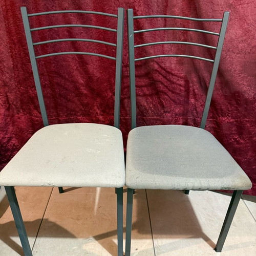 Kitchen chairs used with faded cushions