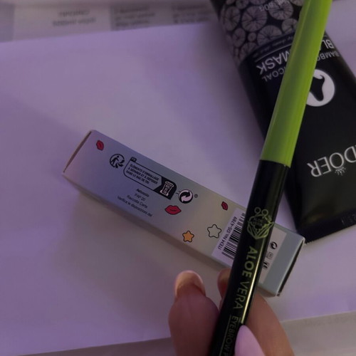Cosmetics set new with black mask, lip oil, eyebrow pencil, mascara