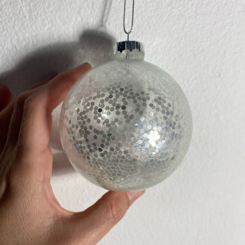 Christmas ball with silver glitter like new, transparent