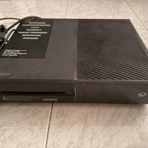 Xbox One Fat 500 GB console with MotoGP 18 game and controller