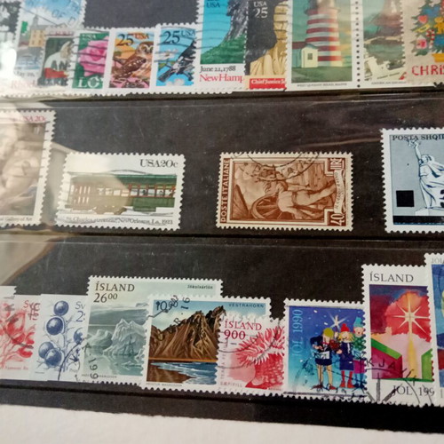 Stamp album with some stamps, mostly cancelled
