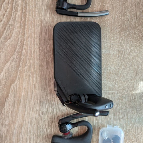 Plantronics Bluetooth headsets used, 2x 5200 and 1x Edge with charger case