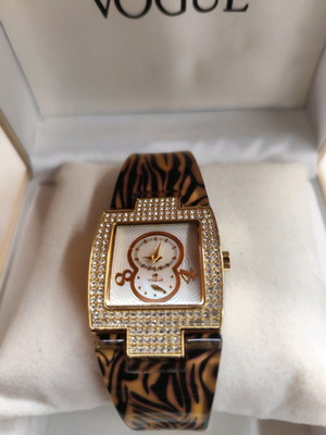 Vogue 855021.2 women's watch like new with animal print and crystals