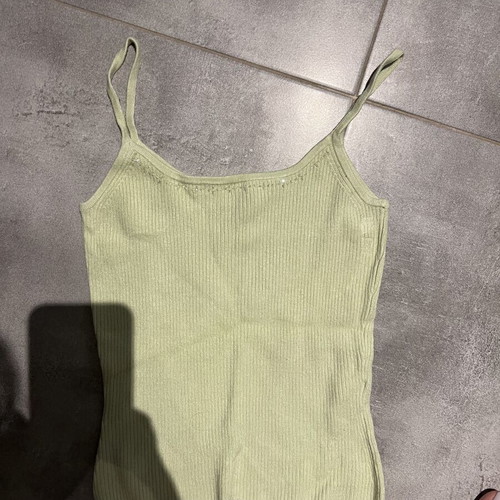 Ribbed green top with thin straps and subtle rhinestones