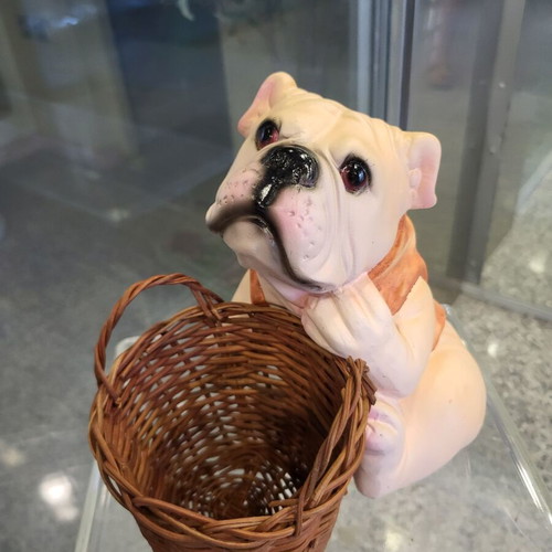 Decorative dog figure with basket