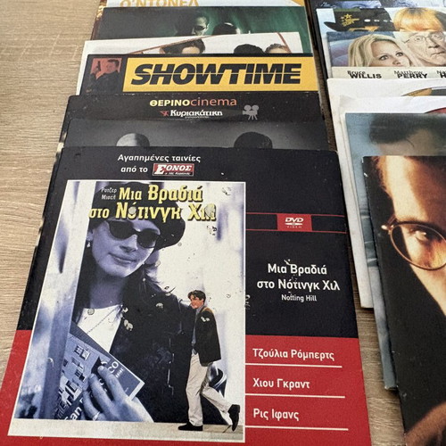 Pack of 30 DVDs with various movies
