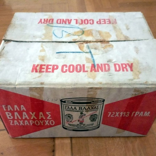 Collectible old Vlachas condensed milk box used