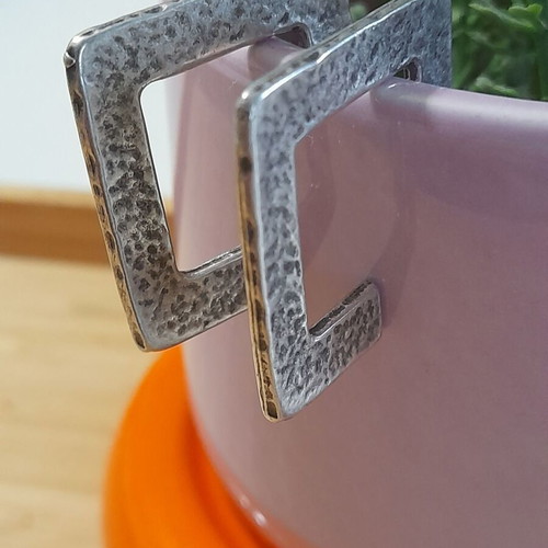 Earrings like new with unique shape and hammered silver design