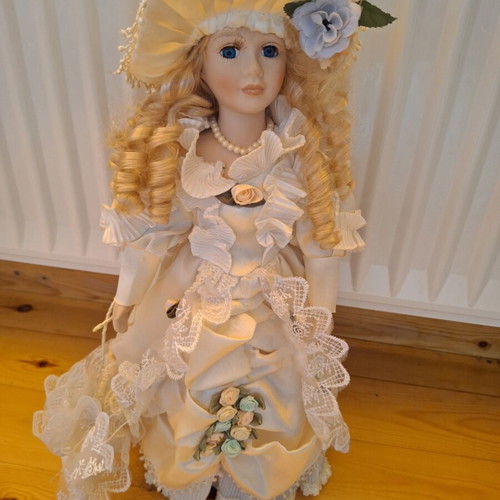 Porcelain doll 43cm