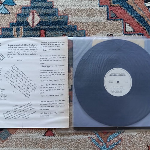 Outsiders vinyl like new, rock