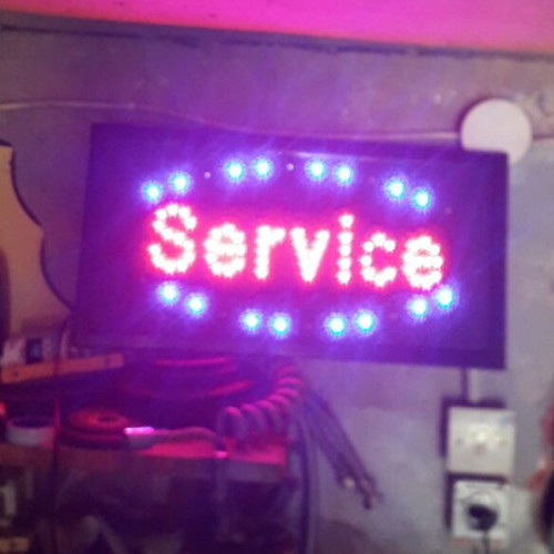 Lighted sign new with moving blue and fixed red LED lights, 50cm