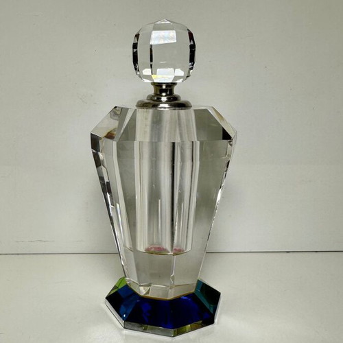 Vintage faceted crystal perfume bottle with iridescent prism base