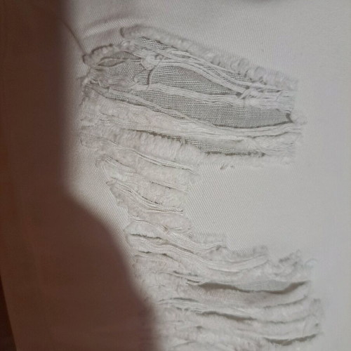 White slim denim pants like new with rips and straight fit