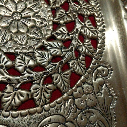 Vintage brass serving tray with embossed handles and angel motifs like new