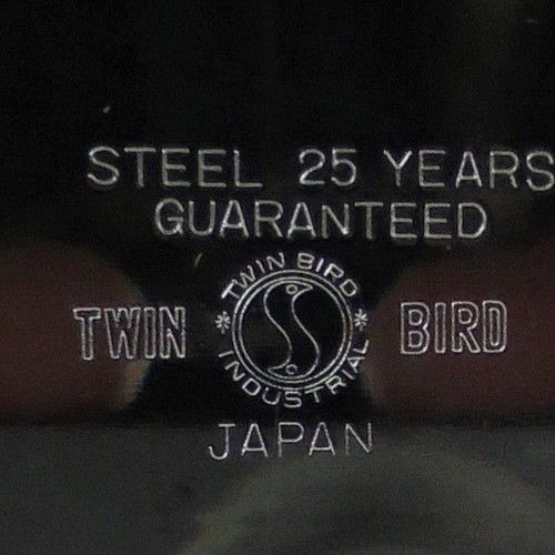 Twin Bird metal serving tray with engraved decoration
