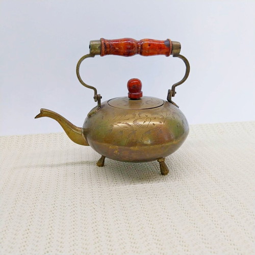 Vintage brass decorative teapot with wooden handle used, England