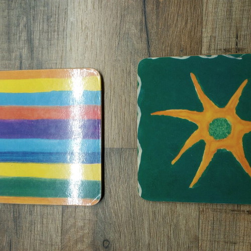 Coasters like new, set of 6 with cork base