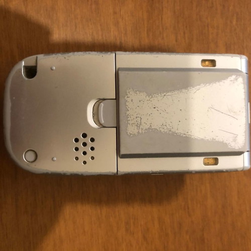 NEC 410i mobile phone used with charger and handsfree