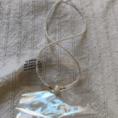 Necklace with white pearls and stainless steel chain like new