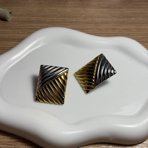 Stainless steel earrings like new, gold and silver color