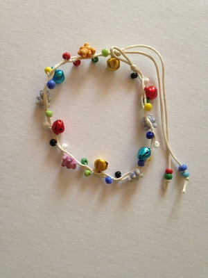Bracelet multicolored used with beads, bells and teddy bears